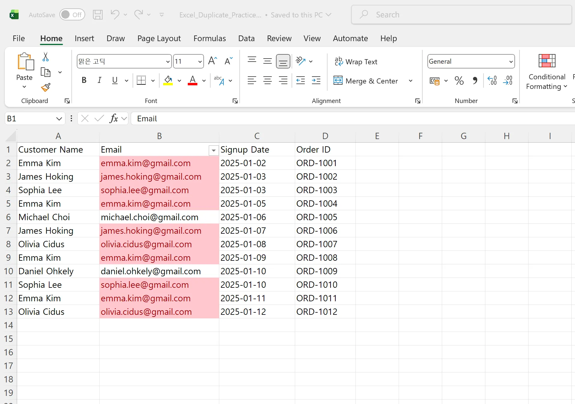 Excel spreadsheet with duplicate email addresses highlighted in pink using conditional formatting